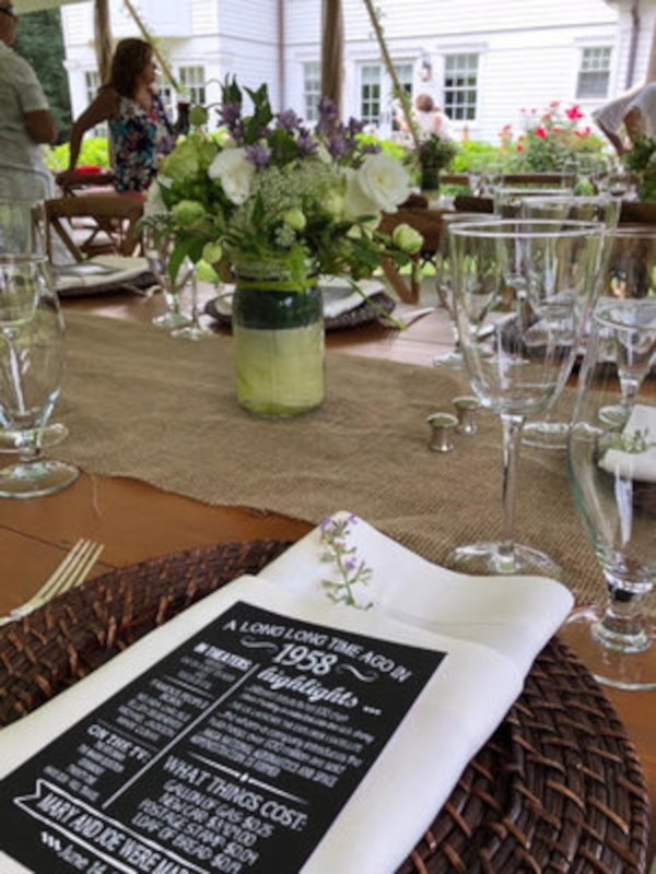 catered table with food and drink at event