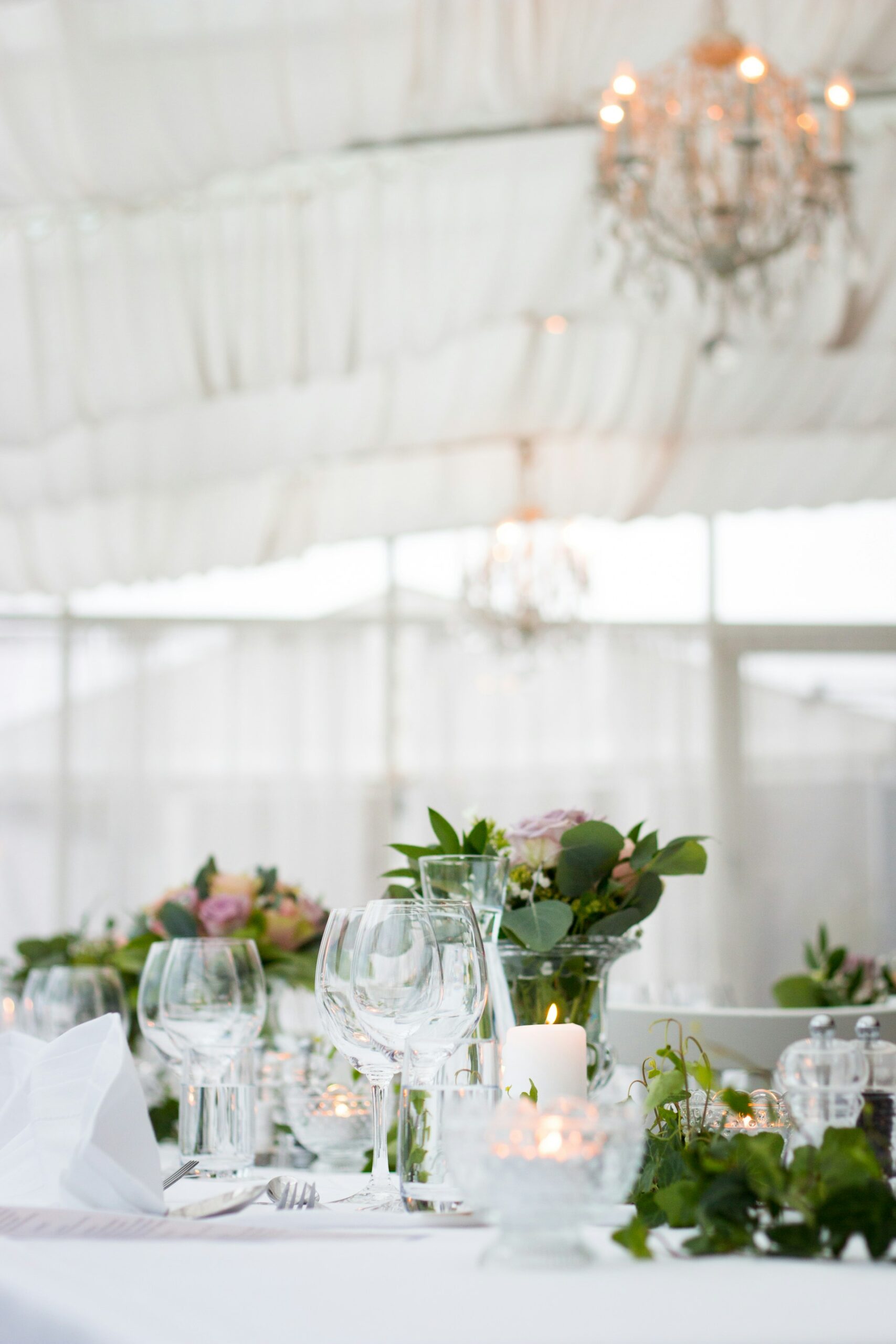 wedding guest table setting with glasses and silverware